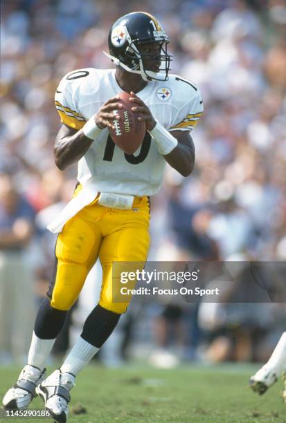 Kordell Stewart of the Pittsburgh Steelers looks to pass against the Baltimore Ravens during an NFL football game October 5, 1997 at Memorial Stadium...