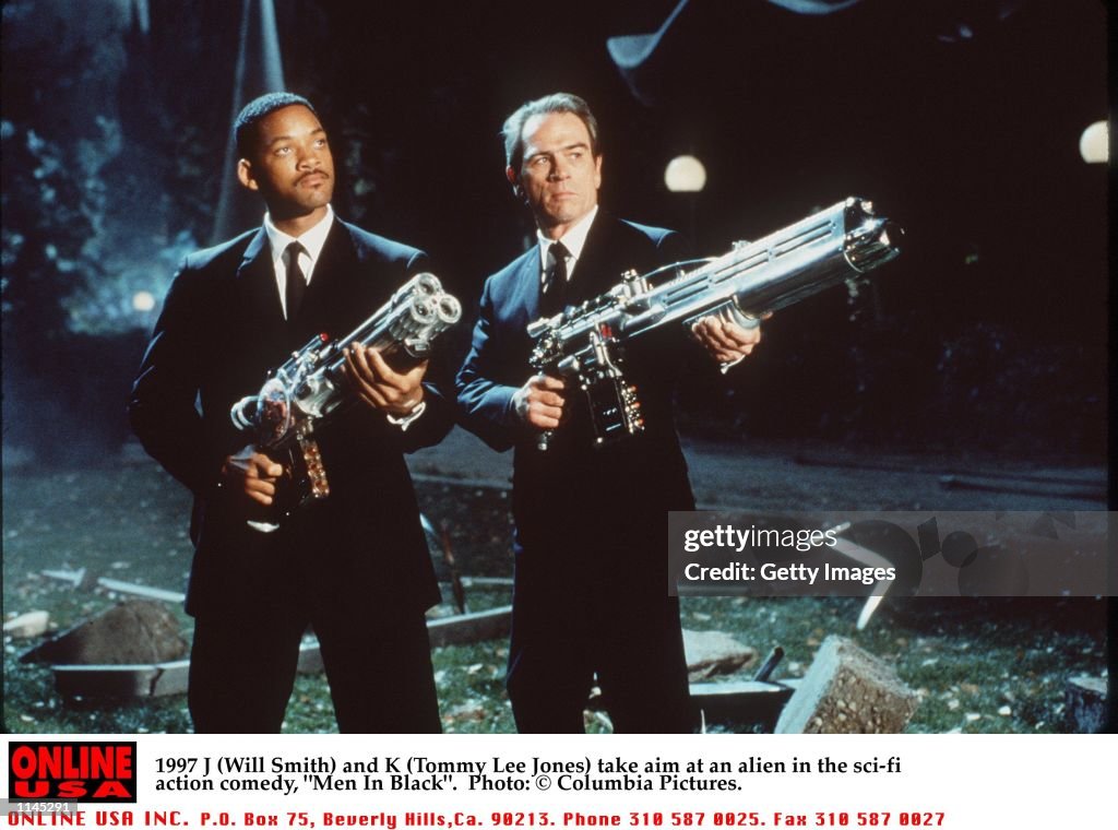 1997 J (Will Smith) and K (Tommy Lee Jones) take aim at an alien in the sci-fi action comedy, "Men I