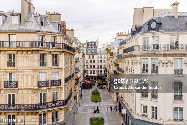 residential apartment buildings in paris, high angle view, france - paris france stock-fotos und bilder