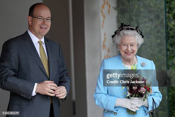 Queen Elizabeth II and Prince Albert II of Monaco visit the Monaco Garden at Chelsea Flower Show Press and VIP Day on May 23, 2011 in London, England.