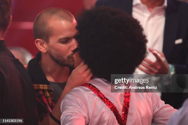 Barbara Becker and her boyfriend are seen on stage during the 5th show of the 12th season of the television competition "Let's Dance" on April 26,...