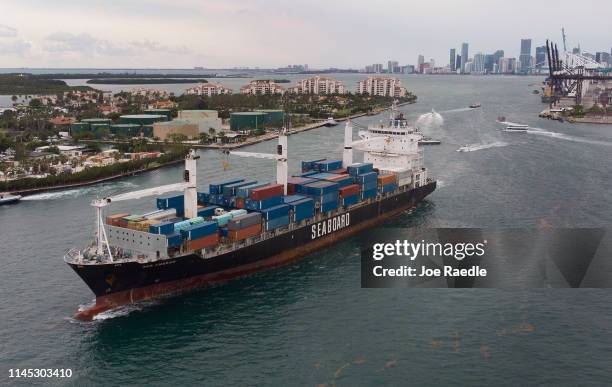 An aerial view from a drone shows the Seaboard Marine cargo ship leaving PortMiami on the day that the Bureau of Economic Analysis announced that the...