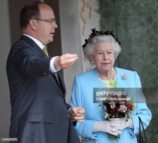 Queen Elizabeth II and Prince Albert II of Monaco visit the Monaco Garden at Chelsea Flower Show Press and VIP Day on May 23, 2011 in London, England.