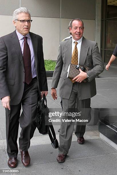 Michael Lohan and his lawyer arrive at the Beverly Hills courthouse for his arraignment on May 23, 2011 in Beverly Hills, California.