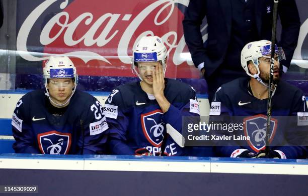 Alexandre Texier of France reacts with teammates after being defeated in the 2019 IIHF Ice Hockey World Championship Slovakia group A game between...