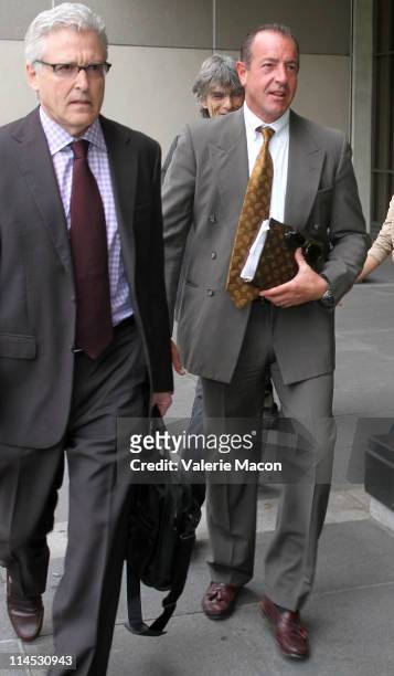 Michael Lohan and his lawyer arrive at the Beverly Hills courthouse for his arraignment on May 23, 2011 in Beverly Hills, California.