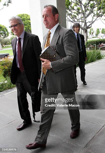 Michael Lohan and his lawyer arrive at the Beverly Hills courthouse for his arraignment on May 23, 2011 in Beverly Hills, California.