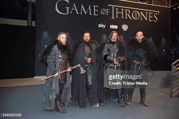 Background actors as Game of Thrones figures attend the "Game of Thrones" TV series VIP screening at Kino in der Kulturbrauerei on May 20, 2019 in...