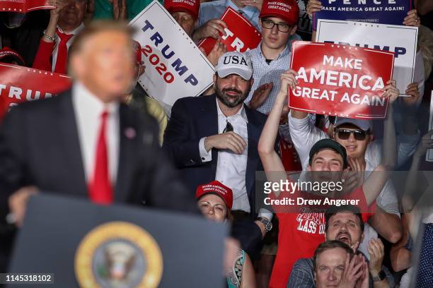 The crowd cheers as U.S. President Donald Trump speaks during a 'Make America Great Again' campaign rally at Williamsport Regional Airport, May 20,...
