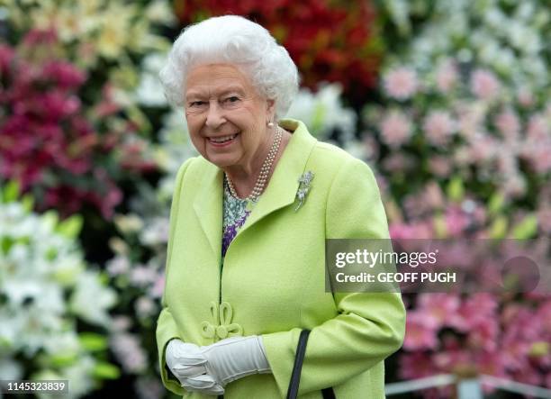 Britain's Queen Elizabeth II visits the 2019 RHS Chelsea Flower Show in London on May 20, 2019. The Chelsea flower show is held annually in the...