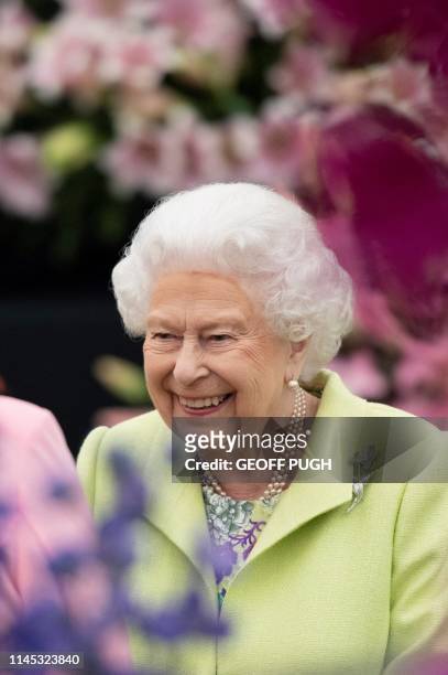 Britain's Queen Elizabeth II visits the 2019 RHS Chelsea Flower Show in London on May 20, 2019. The Chelsea flower show is held annually in the...