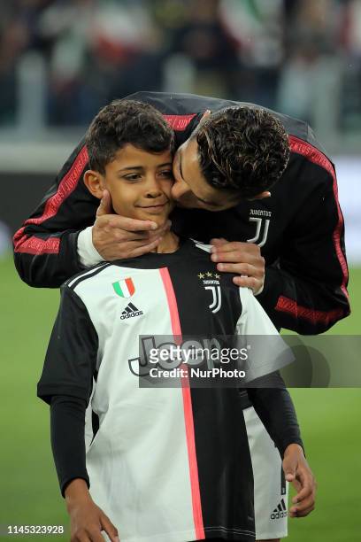 Cristiano Ronaldo of Juventus FC and Cristiano Ronaldo jr. Looks on before the serie A match between Juventus FC and Atalanta BC at Allianz Stadium...