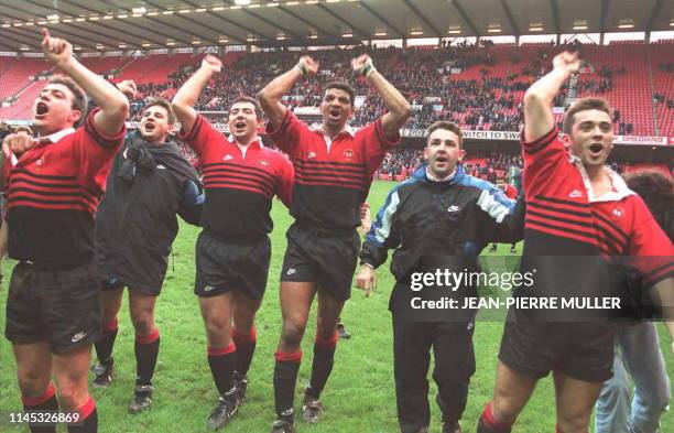 Toulouse captain Emile N'Tamack celebrates with team-mates after winning the Heineken European Rugby Cup, 07 January, after beating Cardiff at the...