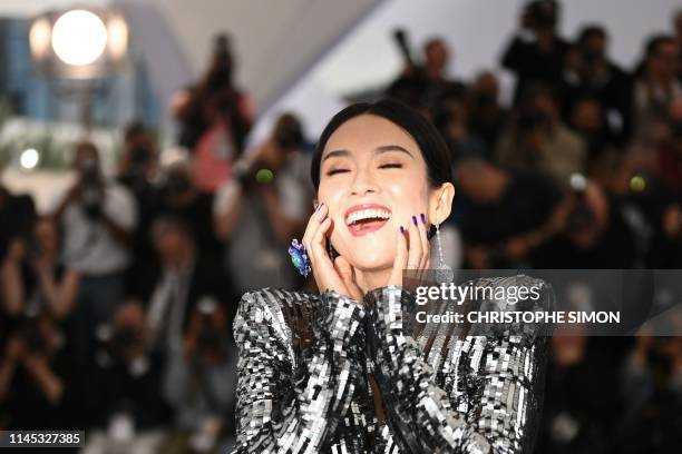 Chinese actress Zhang Ziyi poses during a photocall "Rendez-vous with... Zhang Ziyi" at the 72nd edition of the Cannes Film Festival in Cannes,...