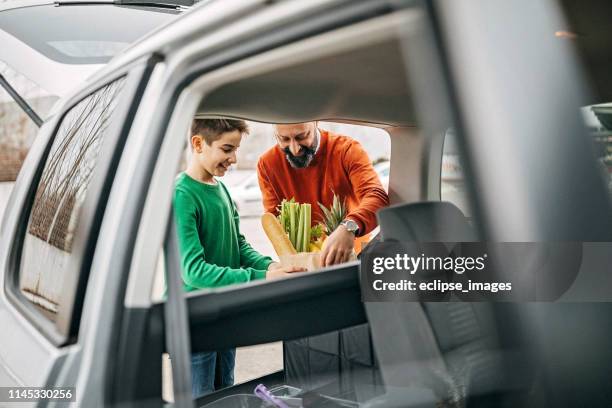 we will surprise mum with our help - plastic bread bags stock pictures, royalty-free photos & images
