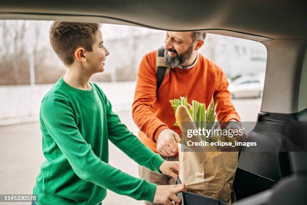 we will surprise mum with our help - plastic bread bags stock pictures, royalty-free photos & images