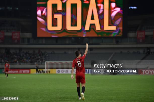 Shanghai SIPG's Oscar celebrates after scoring a goal during the AFC Champions League football match between Shanghai SIPG and Ulsan Hyundai in...