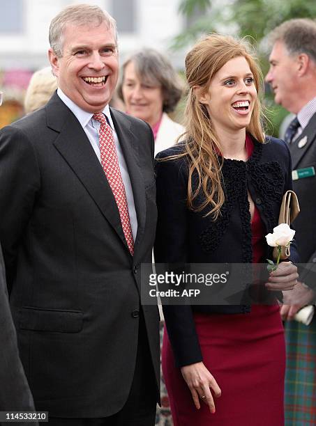 Britain's Prince Andrew , Duke of York walks with his daughter Princess Beatrice as they visit at the Chelsea Flower Show press and VIP day in London...