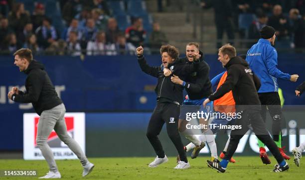 Michael Oenning of 1. FC Magdeburg and Jan Kirchhoff of 1. FC Magdeburg celebartes during the Second Bundesliga match between Hamburger SV and 1. FC...