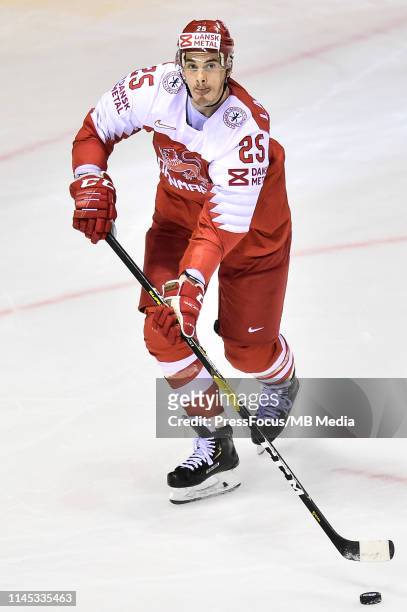 Oliver Lauridsen of Denmark controls the puck during the 2019 IIHF Ice Hockey World Championship Slovakia group A game between Slovakia and Denmark...