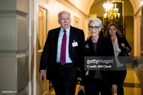 John Brennan, former Director of the Central Intelligence Agency, and Wendy Sherman, former Under Secretary of State for Political Affairs, arrive to...