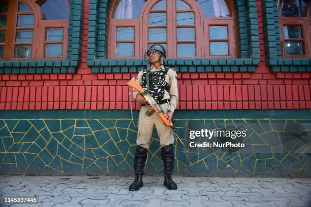 Indian Government forces remain alert during curfew in Old city area of Srinagar, Indian Administered Kashmir on 21 May 2019. Curfew was implemented...