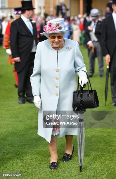 Queen Elizabeth II attending the Royal Garden Party at Buckingham Palace on May 21, 2019 in London, England.