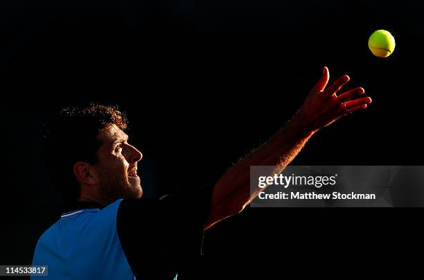 Michael Berrer of Germany serves during the men's singles first round match between Michael Berrer of Germany and Milos Raonic of Canada on day two...