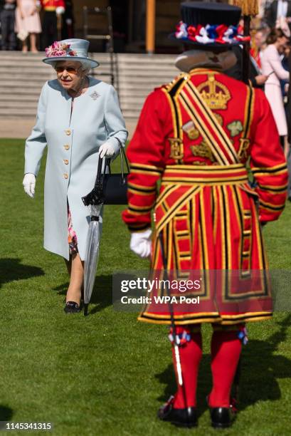 Queen Elizabeth II attending the Royal Garden Party at Buckingham Palace on May 21, 2019 in London, England.