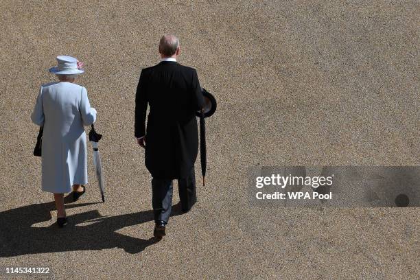 Queen Elizabeth II and Prince Andrew, Duke of York arrive for the Royal Garden Party at Buckingham Palace on May 21, 2019 in London, England.