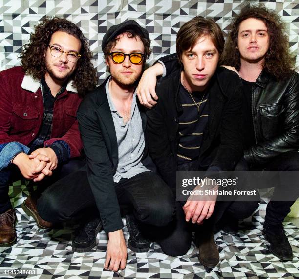 Johnny Bond, Bob Hall, Van McCann and Benji Blakeway of Catfish And The Bottlemen pose backstage after an instore event to celebrate the release of...