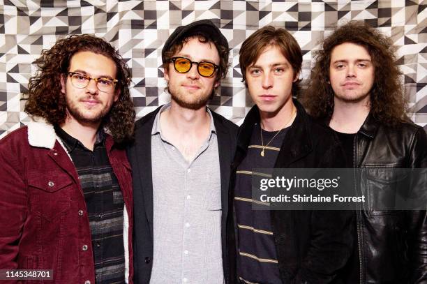 Johnny Bond, Bob Hall, Van McCann and Benji Blakeway of Catfish And The Bottlemen pose backstage after an instore event to celebrate the release of...