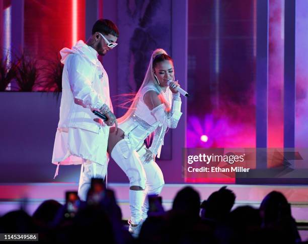 Anuel AA and Karol G perform during the 2019 Billboard Latin Music Awards at the Mandalay Bay Events Center on April 25, 2019 in Las Vegas, Nevada.