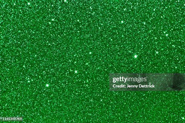 green glitter background - glitter fotografías e imágenes de stock