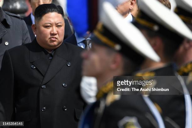 North Korean leader Kim Jong-un reviews the honour guard during the ceremony at Vladivostok Station a day after his meeting with Russian President...