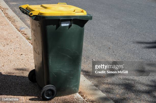 plastic wheeled recycling rubbish bin beside the road for rubbish collection - bin fotografías e imágenes de stock