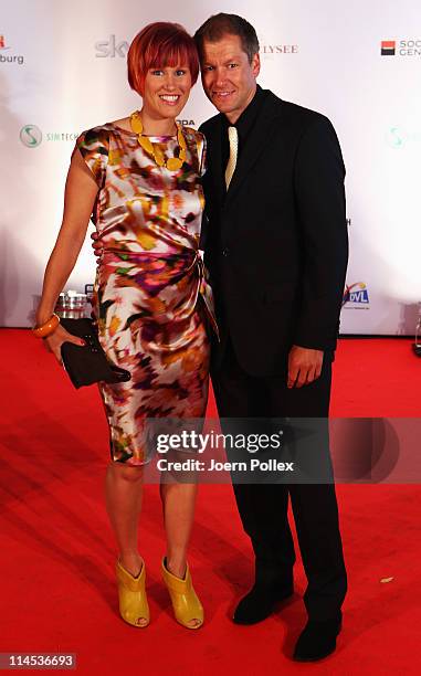 Kati Wilhelm and her friend Andreas Emslander arrive for the Herbert Award 2011 Gala at the Elysee Hotel on May 23, 2011 in Hamburg, Germany.