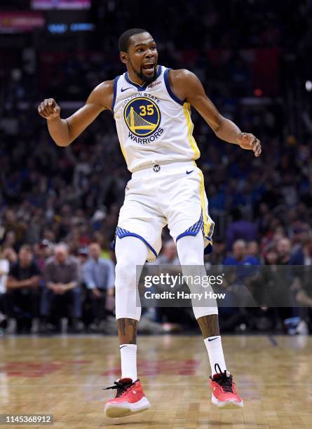 Kevin Durant of the Golden State Warriors reacts to his three pointer in the first half against the LA Clippers during Game Six of Round One of the...