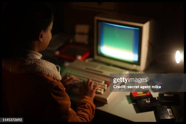 typing on classic computer - retro computer monitor stock pictures, royalty-free photos & images