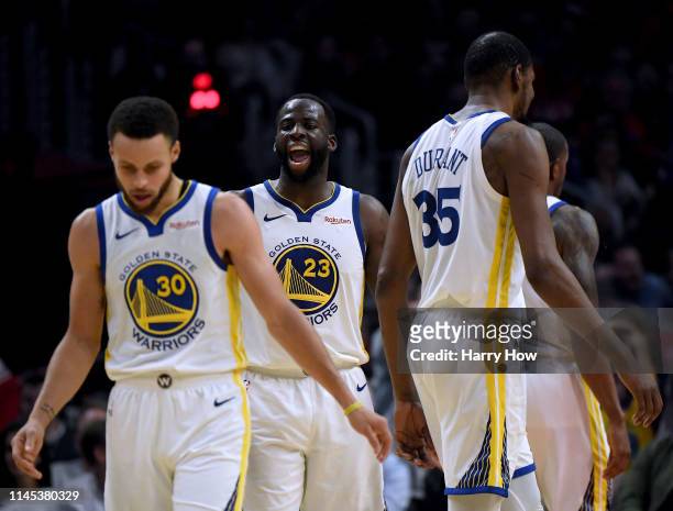 Draymond Green of the Golden State Warriors reacts to Stephen Curry and Kevin Durant in a 129-110 win over the LA Clippers during Game Six of Round...