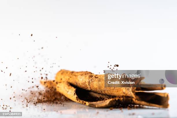 cinnamon with high speed photography - powder colliding stock pictures, royalty-free photos & images