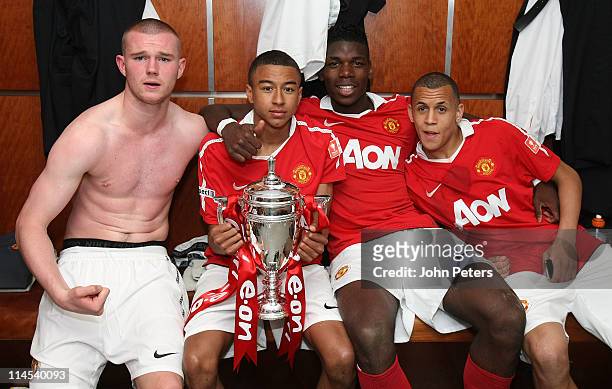 Ryan Tunnicliffe, Jesse Lingard, Paul Pogba and Ravel Morrison of Manchester United Academy Under-18s celebrate with the FA Youth Cup trophy in the...