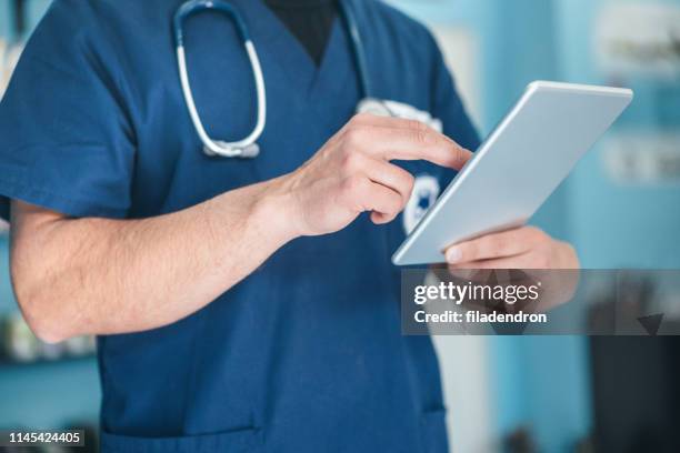Veterinary Stock Photo Using Computer 2,021 Veterinarian Computer Stock Photos, High-Res Pictures, and Images ...