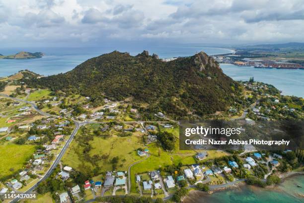 overhead view of small town in new zealand. - northland region stock pictures, royalty-free photos & images