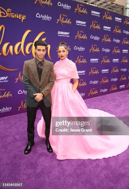 Mena Massoud and Naomi Scott attend the World Premiere of Disneys "Aladdin" at the El Capitan Theater in Hollywood CA on May 21 in the culmination...