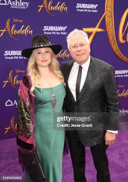 Composer Alan Menken and his daughter Anna Rose attend the World Premiere of Disneys "Aladdin" at the El Capitan Theater in Hollywood CA on May 21...