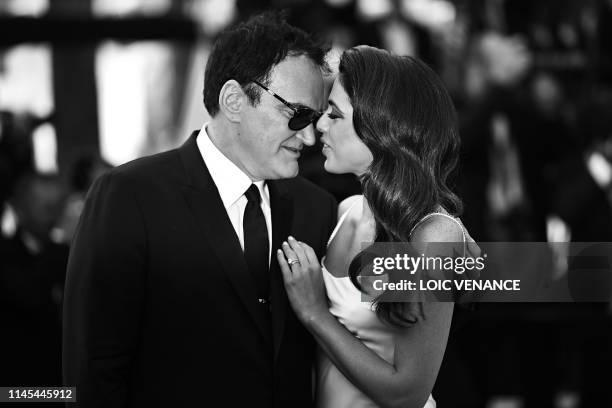 Film director Quentin Tarantino and his wife Israeli singer Daniella Pick arrive for the screening of the film "Once Upon a Time... In Hollywood" at...