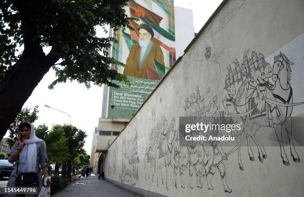Mural depicting Ruhollah Khomeini, founder of the Islamic republic of Iran, stands by a roadside in Tehran, Iran on May 22, 2019.
