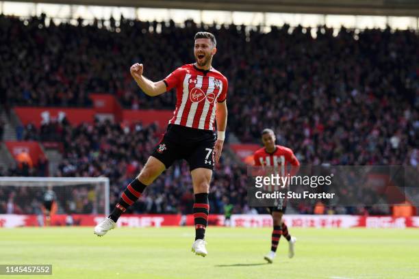 Shane Long of Southampton celebrates after scoring his team's first goal during the Premier League match between Southampton FC and AFC Bournemouth...