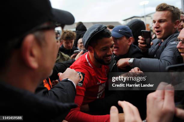 Jobi McAnuff of Leyton Orient celebrates with fans as they win the title after the Vanarama National League match between Leyton Orient and Braintree...
